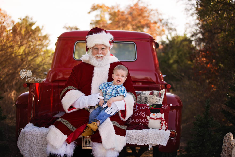 Fulshear family photographer with Santa