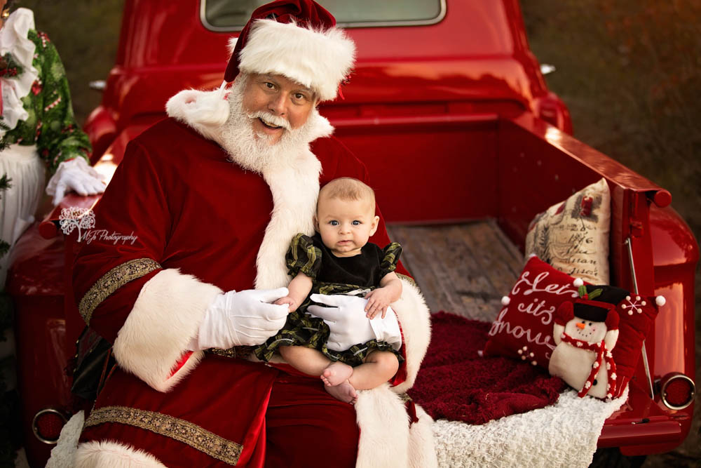 Fulshear family photographer with Santa
